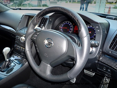 V36スカイラインクーペ　アクセスエボリューション　ガングリップステアリング V36 スカイライン Coupe Steering Wheel Carbon+GunGrip | Autostyle